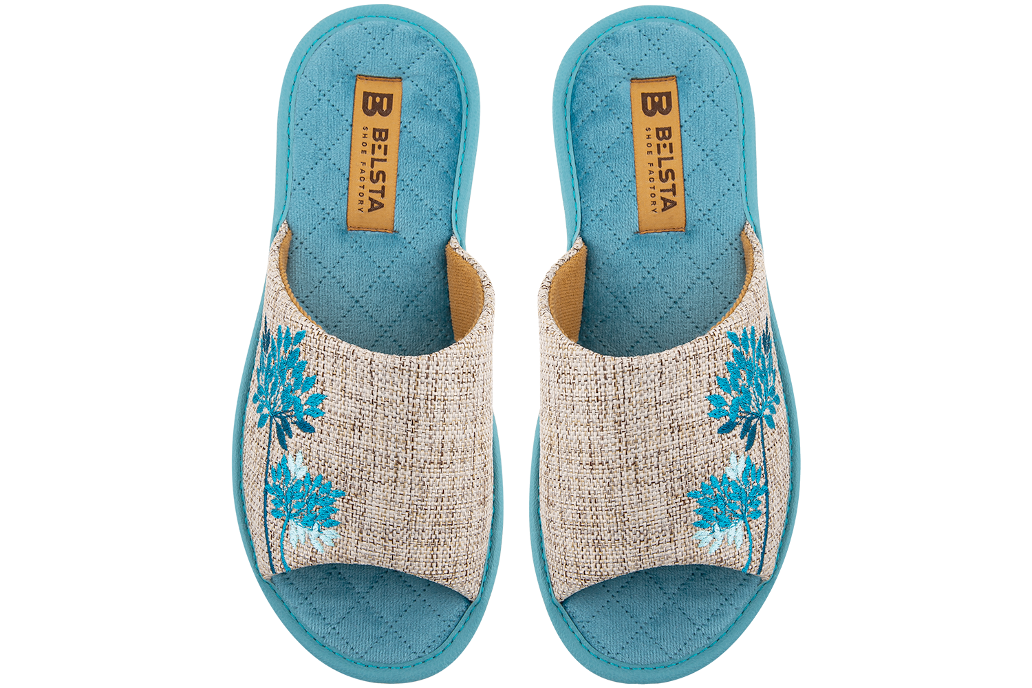 Indoor women's open slippers made of textile and quilted velvet with a magnolia design